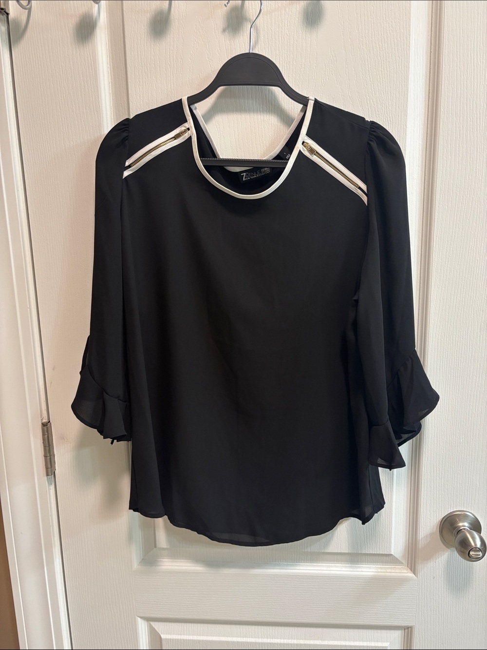 Black Blouse with White Trim and Gold Zipper Detail